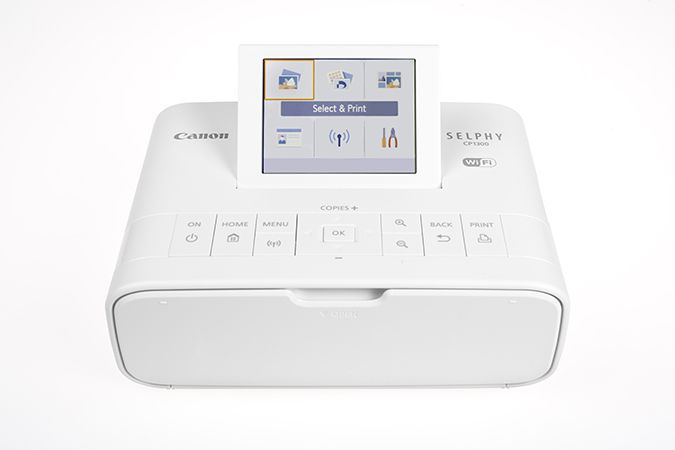 Принтер Canon SELPHY CP1300 White (2235C002), (портативный, термосублимационный, 10x15, 300x300dpi, LCD, USB, WiFi, PictBridge) белый