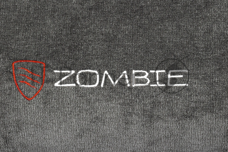 Кресло игровое Zombie Ghost Fabric серый Light-19 крестов. пластик